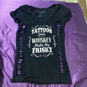 T shirt. From Spencer’s. Size small.